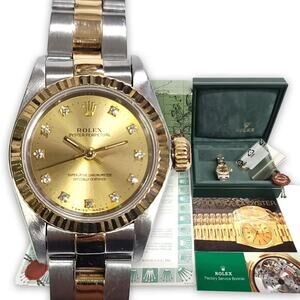 Rolex Ladies 18K/SS Oyster Perpetual Factory Champagne Diamond Dial Ref#67193